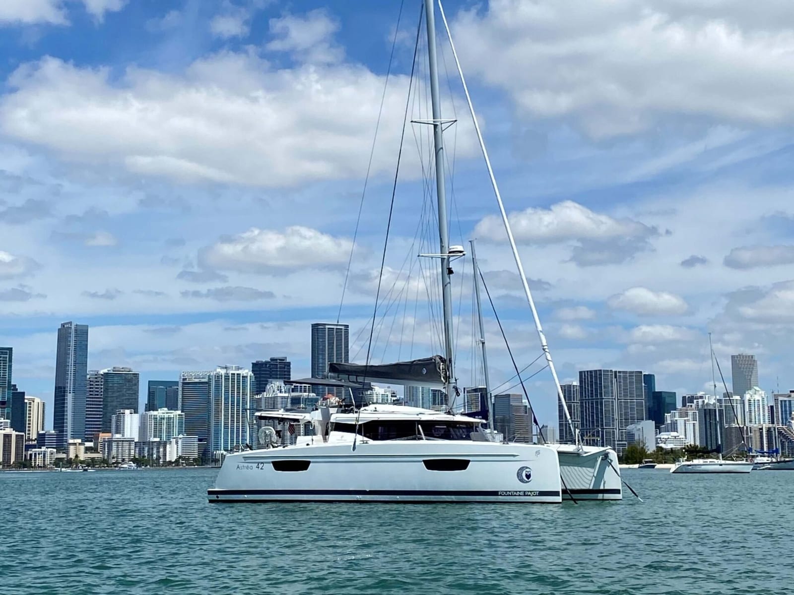 A Fountaine Pajot catamaran on Biscayne Bay against the Miami skyline